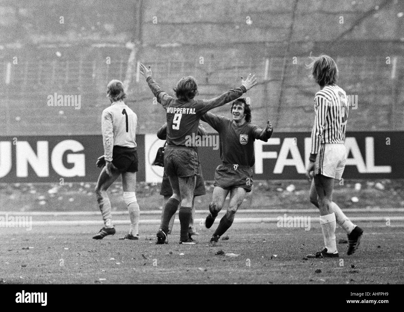 football, Bundesliga, 1972/1973, Stadium am Zoo in Wuppertal, Wuppertaler SV versus Hertha BSC Berlin 4:1, scene of the match, 3:0 goal to Wuppertal, f.l.t.r. keeper Thomas Zander (Berlin), goal scorer Guenter Proepper (WSV), Gustav Jung (WSV), Hans Weine Stock Photo