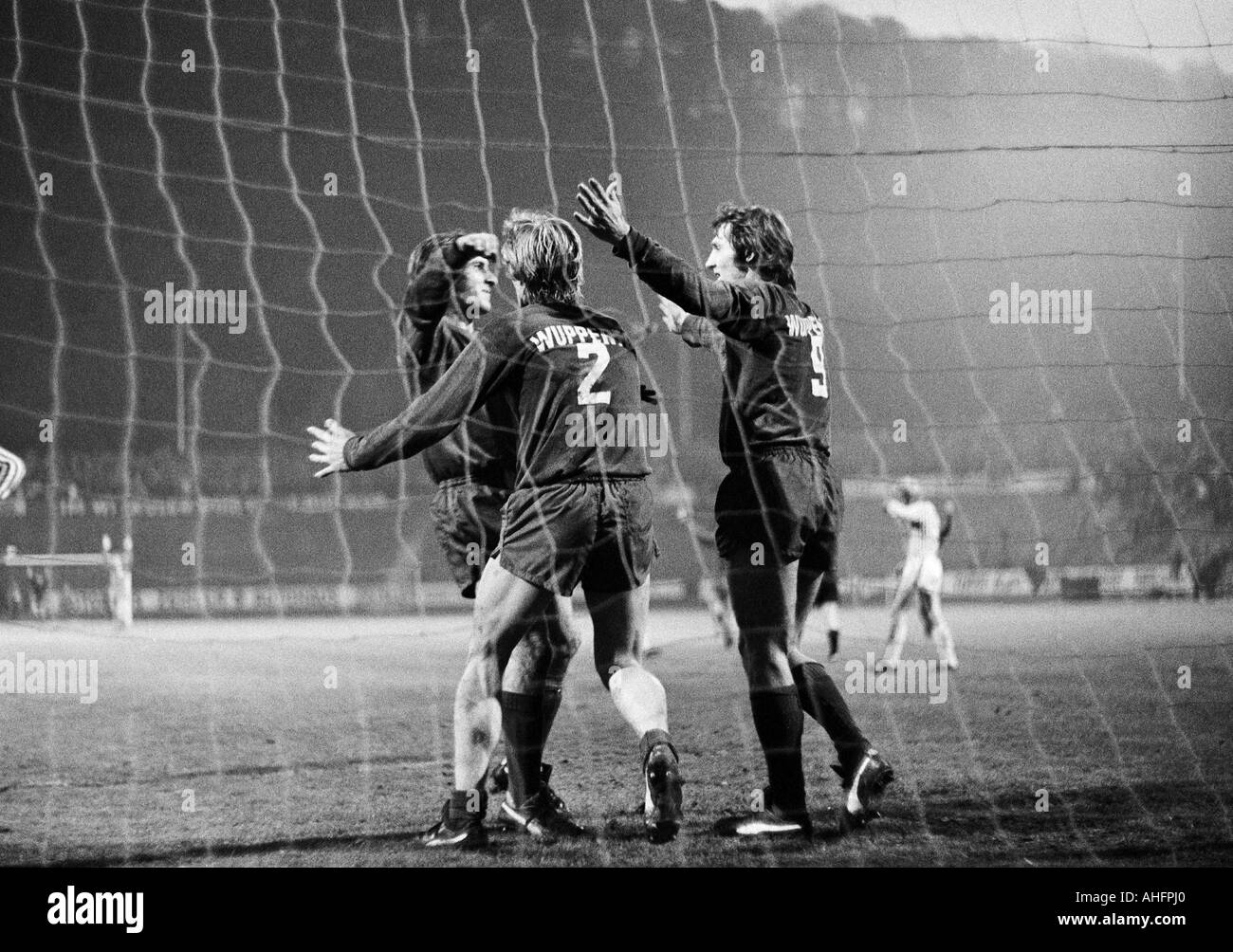 football, Bundesliga, 1972/1973, Stadium am Zoo in Wuppertal, Wuppertaler SV versus Hertha BSC Berlin 4:1, scene of the match, 4:1 goal to Wuppertal, f.l.t.r. goal scorer Gustav Jung (WSV), Manfred Cremer (WSV, 2), Guenter Proepper (WSV) Stock Photo