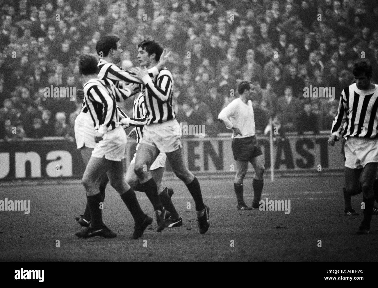 football, Regionalliga West, 1967/1968, Niederrhein Stadium in Oberhausen, Rot-Weiss Oberhausen versus ETB Schwarz-Weiss Essen 3:1, scene of the match, Horst Kracht (ETB, 2.f.l.) and Hans Walitza (ETB, 3.f.l.) rejoicing at a goal to ETB, behind Lothar Kob Stock Photo