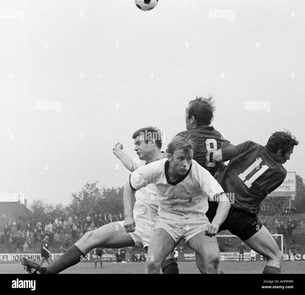 football, Regionalliga West, 1967/1968, ETB Schwarz-Weiss Essen versus Bayer Leverkusen 3:3, Stadium am Uhlenkrug in Essen, scene of the match, f.l.t.r. Horst Kracht (ETB), Herbert Stoffmehl (ETB), Helmut Richert (Bayer), Friedhelm Strelczyk (Bayer) Stock Photo