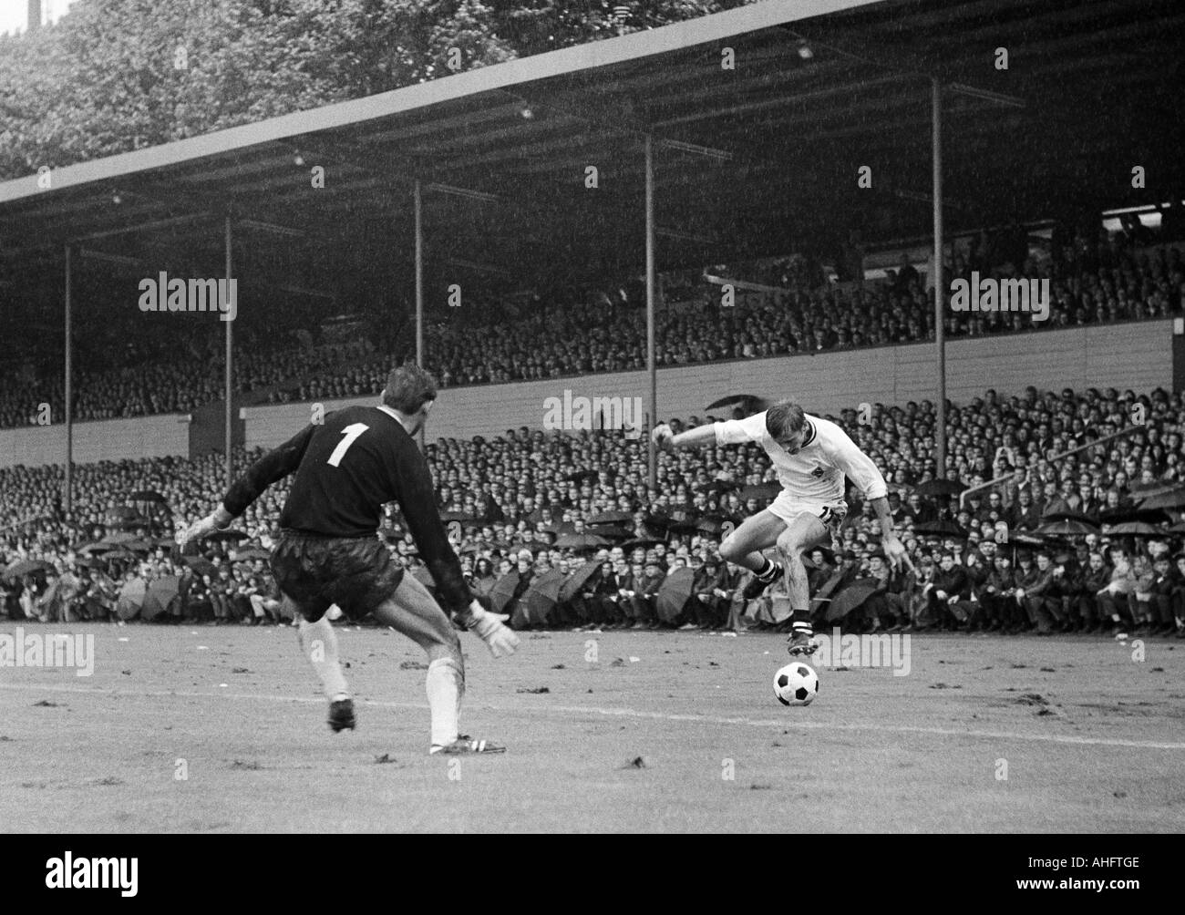 football, Bundesliga, 1968/1969, Borussia Dortmund versus Borussia Moenchengladbach 1:3, Stadium Rote Erde in Dortmund, scene of the match, left Klaus Guenther (Dortmund), right Klaus Ackermann (Gladbach) Stock Photo