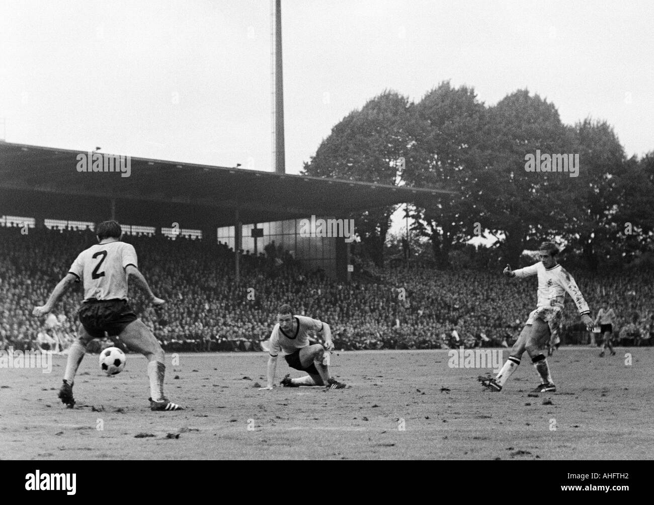 football, Bundesliga, 1968/1969, Borussia Dortmund versus Borussia Moenchengladbach 1:3, Stadium Rote Erde in Dortmund, scene of the match, f.l.t.r. Reinhold Wosab, Gerd Peehs (both Dortmund), Erwin Kremers (Gladbach) Stock Photo