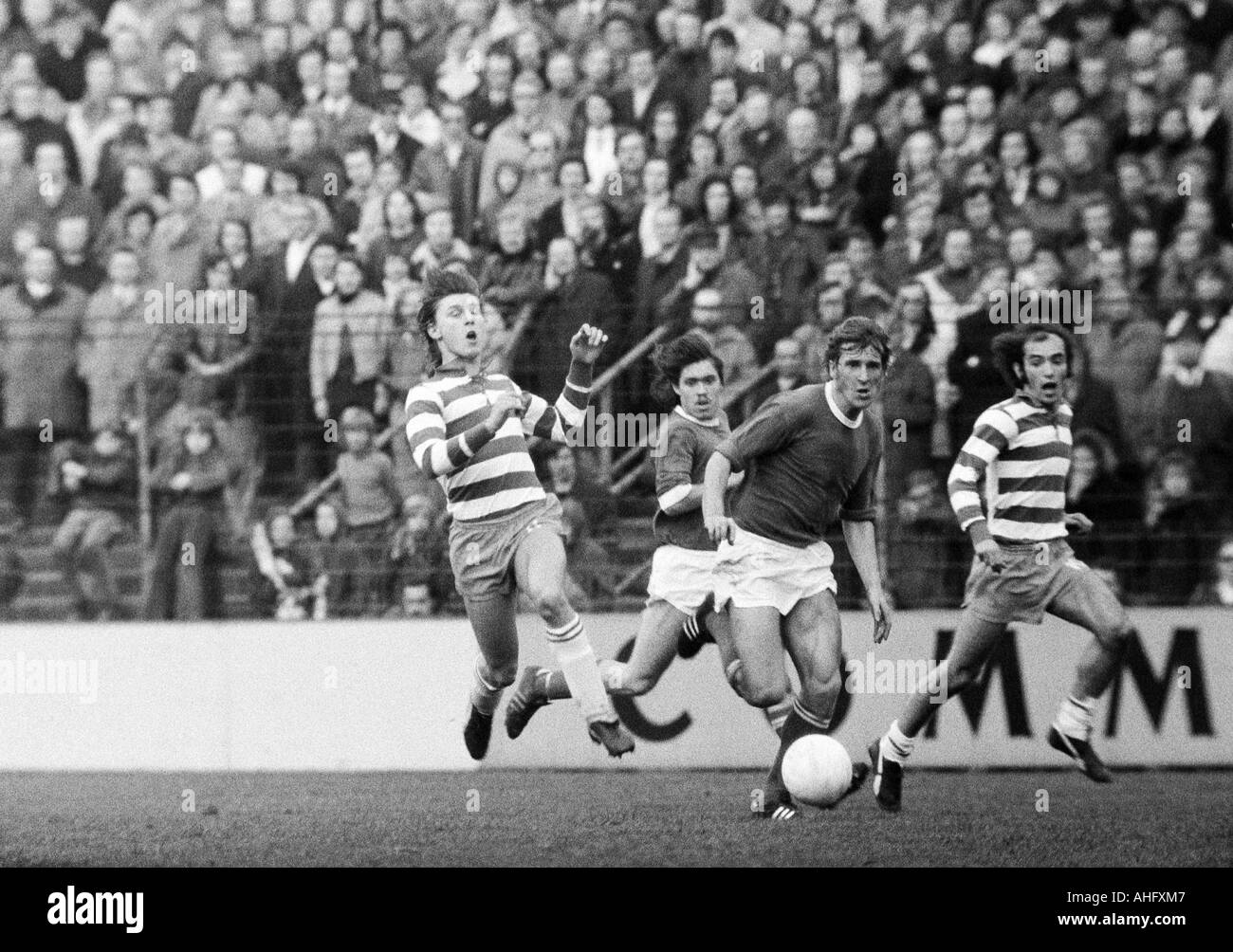 football, Bundesliga, 1972/1973, FC Schalke 04 versus MSV Duisburg 1:1, Glueckaufkampfbahn Stadium in Gelsenkirchen, scene of the match, f.l.t.r. Ronald Worm (MSV), Manfred Dubski (S04), Herbert Luetkebohmert (S04), Johannes Linssen (MSV) Stock Photo