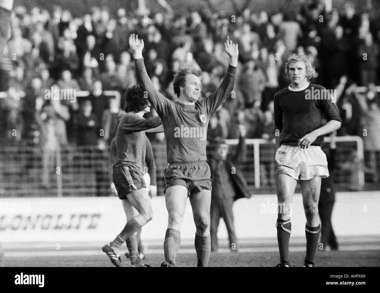 football, Bundesliga, 1972/1973, Niederrhein Stadium in Oberhausen, Rot-Weiss Oberhausen versus FC Schalke 04 2:1, scene of the match, 1:0 goal to Oberhausen by Ditmar Jakobs (not pictured), Lothar Kobluhn (RWO) rejoicing, right Rolf Ruessmann (S04) Stock Photo