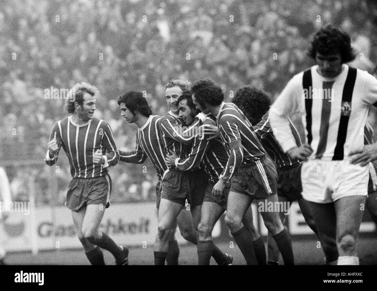 football, Bundesliga, 1972/1973, Borussia Moenchengladbach versus FC Bayern Munich 0:3, Boekelberg Stadium, scene of the match, 0:2 goal to Munich, f.l.t.r. Ulrich Hoeness (FCB), Gerd Mueller (FCB), Bernd Duernberger (FCB), goal scorer Franz Krauthausen ( Stock Photo