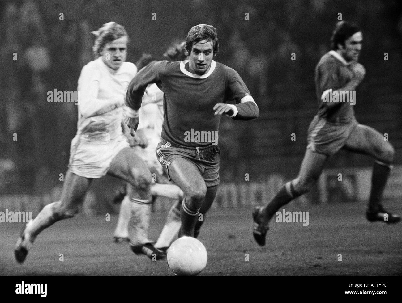 football, Bundesliga, 1973/1974, FC Schalke 04 versus 1. FC Cologne 2:2, Park Stadium in Gelsenkirchen, scene of the match, f.l.t.r. Herbert Hein (Koeln), Erwin Kremers (S04), Peter Ehmke (S04) Stock Photo
