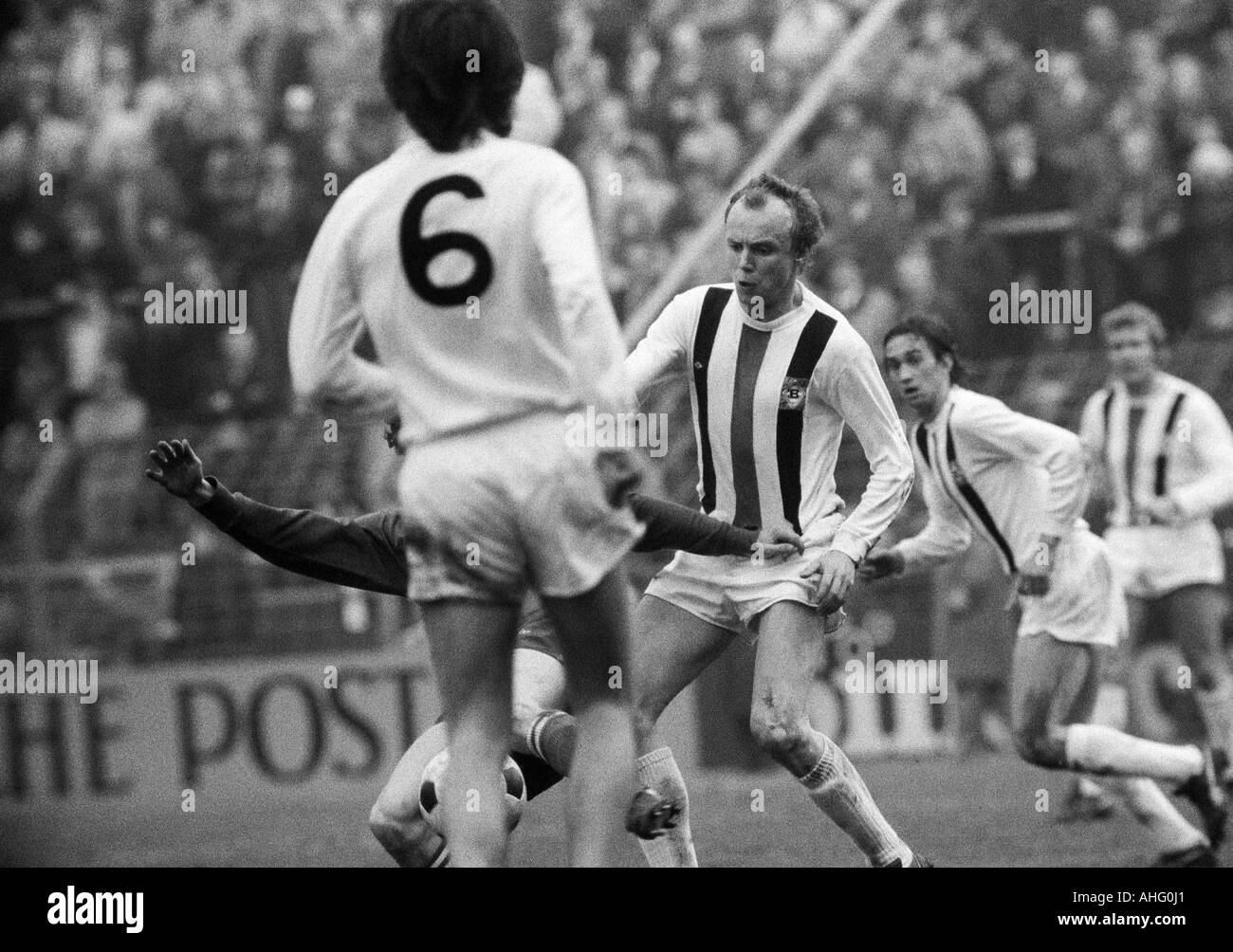 football, Bundesliga, 1973/1974, Boekelberg Stadium, Borussia Moenchengladbach versus MSV Duisburg 3:2, scene of the match, Hans Juergen Wittkamp (MG) fights for the ball, behind him Ulrich Stielike (MG) and Klaus Dieter Sieloff (MG) Stock Photo