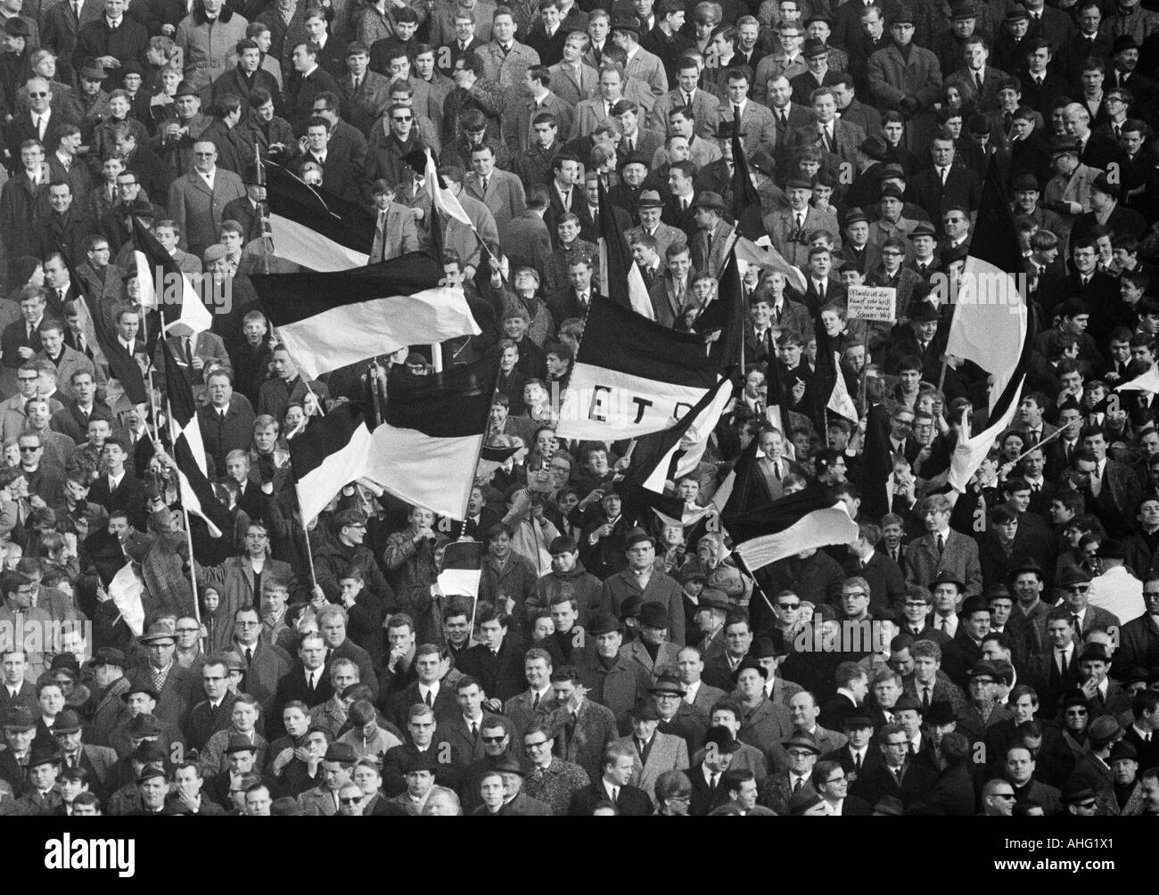 football, Regionalliga West, 1966/1967, ETB Schwarz-Weiss Essen versus Arminia Bielefeld 2:0, Stadium am Uhlenkrug in Essen, crowd of spectators, Essen football fans waving their club flags Stock Photo