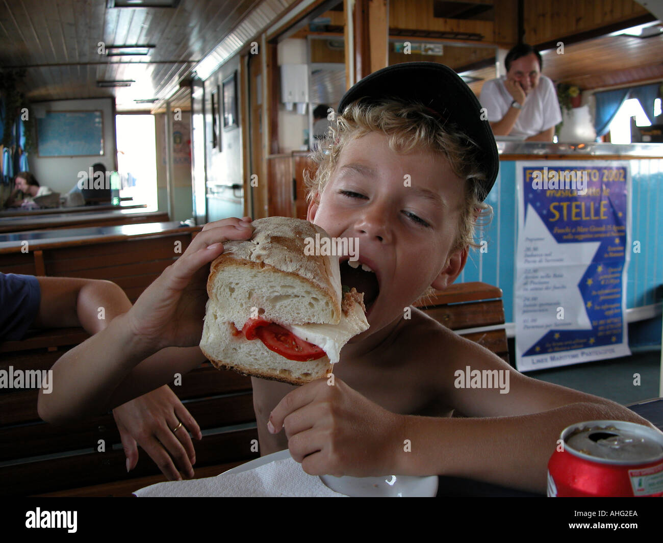 Greedy Boy Stock Photo