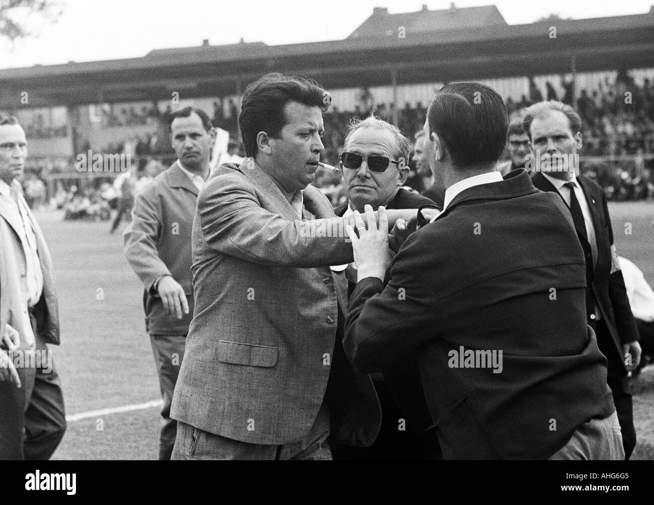 football, German Amateur Championship 1969, final, SC Juelich 1910 versus SpVgg Erkenschwick 2:1, Grotenburg Stadium in Krefeld-Uerdingen, dispute, act of violence, stewards bring an drunken football fan from the pitch Stock Photo