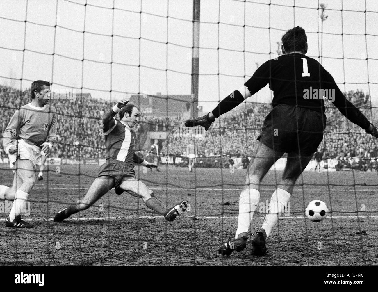 football, Bundesliga, 1969/1970, Borussia Moenchengladbach versus 1860 Munich 3:1, Boekelberg Stadium, scene of the match, f.l.t.r. Zeljko Perusic (1860), Horst Koeppel (Gladbach), keeper Petar Radenkovic (1860) Stock Photo