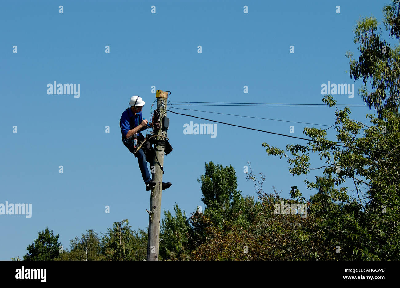 Telecom engineer making repairs Stock Photo - Alamy