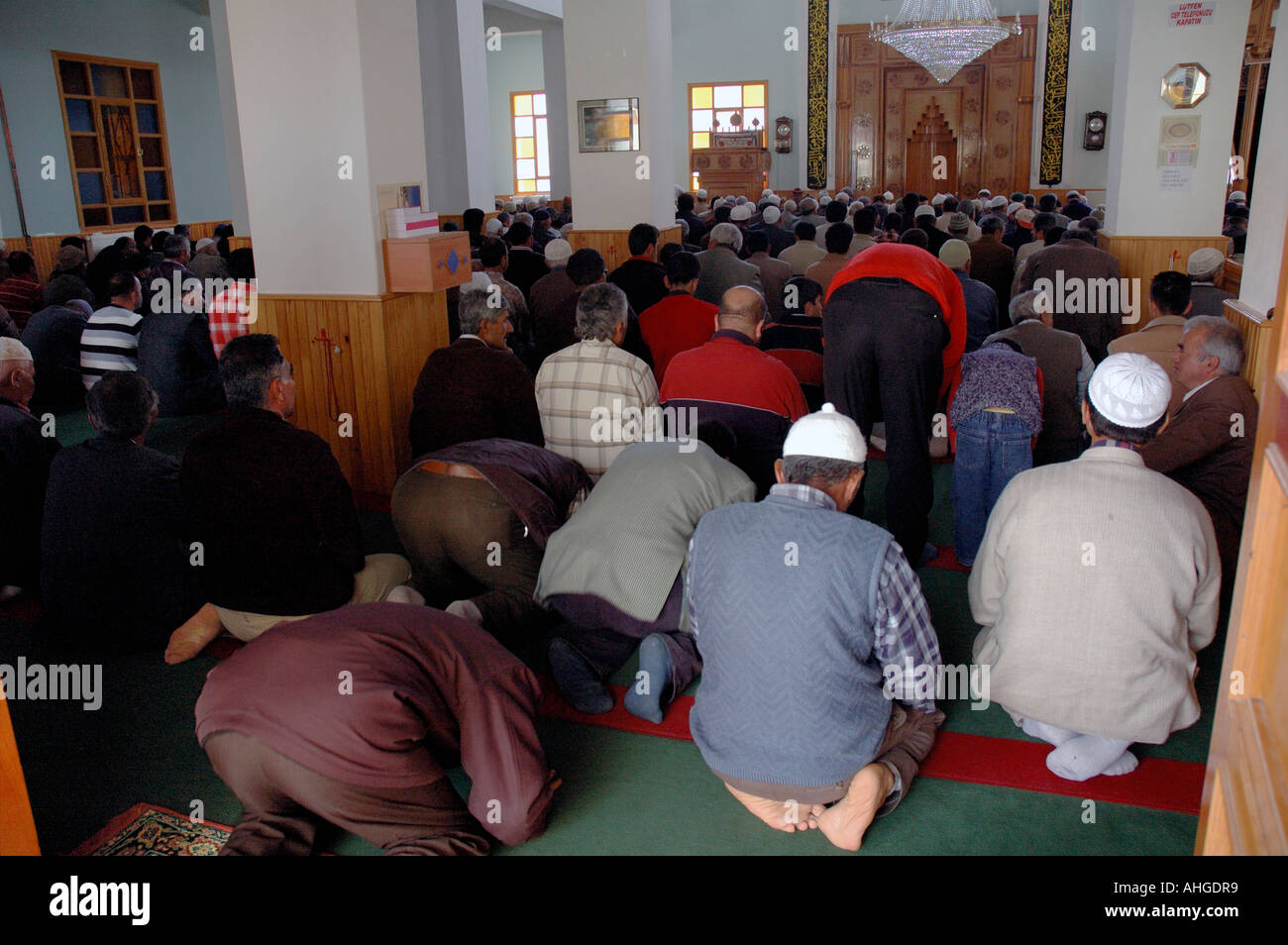 Muslim men praying inside Mosque in village of Gombe in Anatolya Southern Turkey. Stock Photo