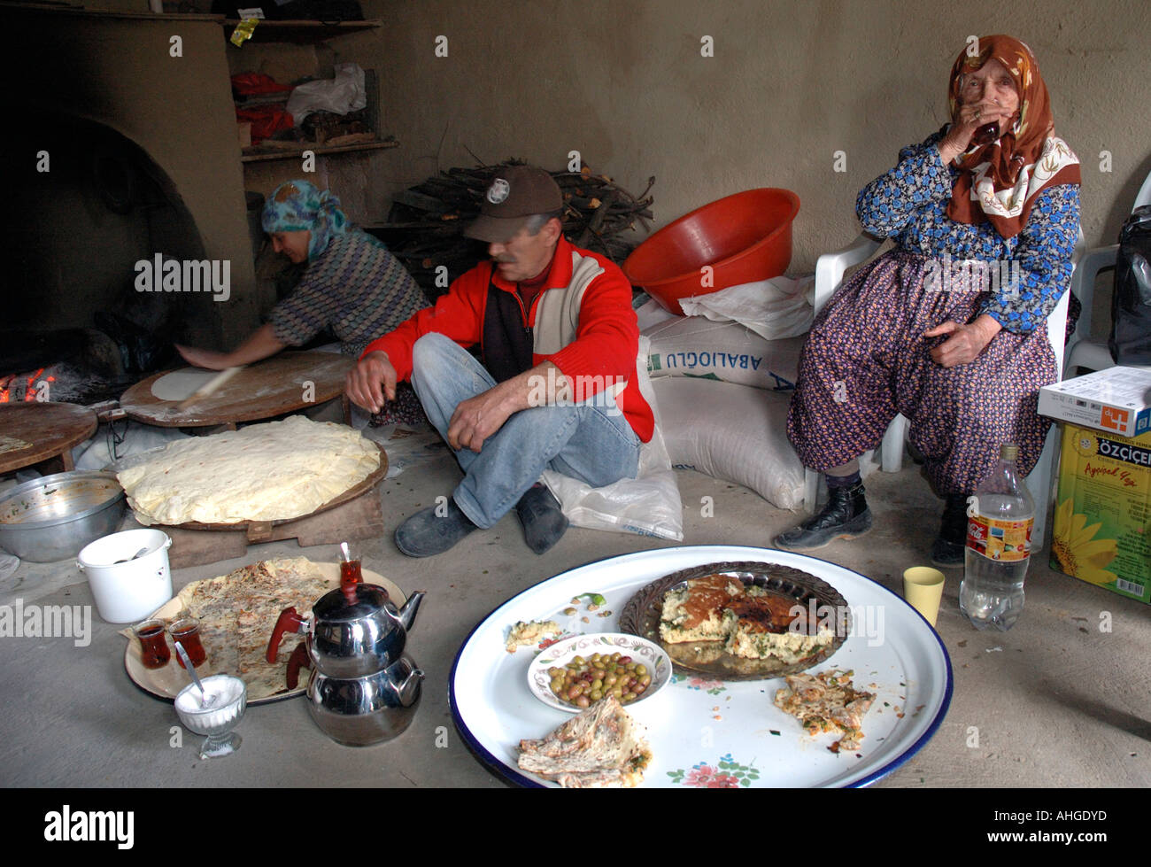 Family of different generations having meal in small rural village of Eymir in Anatolia Southern Turkey. Stock Photo