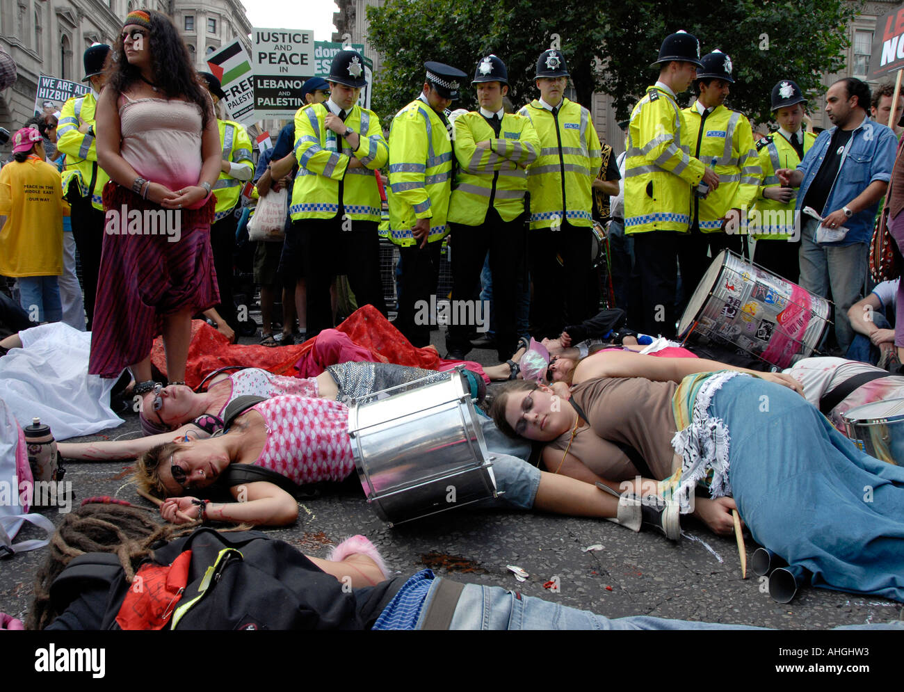 Lie down demonstration in Whitehall in front of Downing Street in London of about 100,000 people protesting Israeli attack on Le Stock Photo