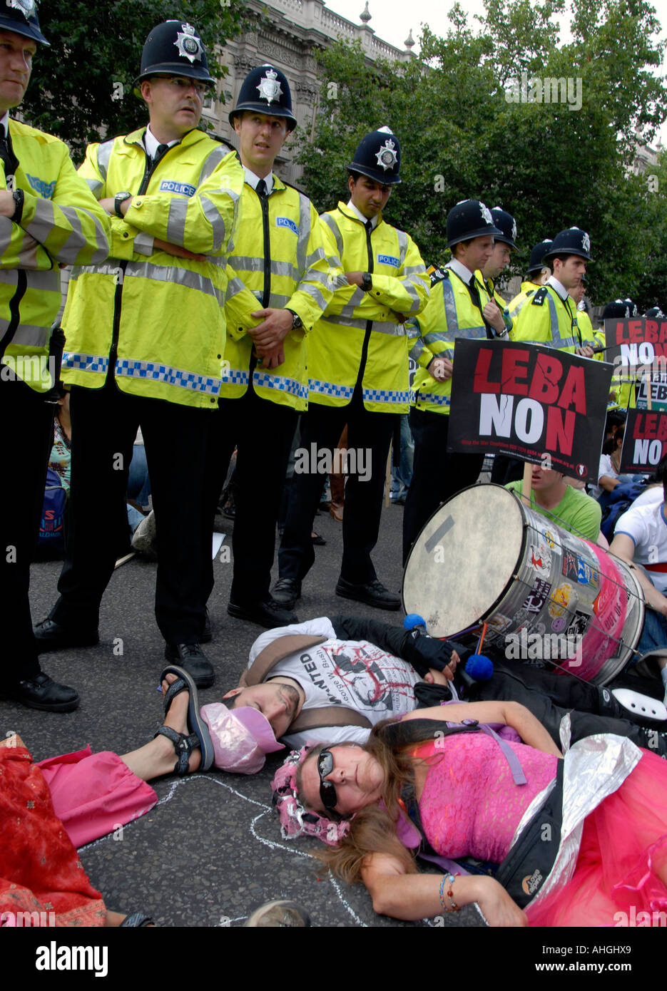 Lie down demonstration Downing Street Whitehall London when 100,000 people protest Israeli attack on Lebanon on August 5 2006. Stock Photo