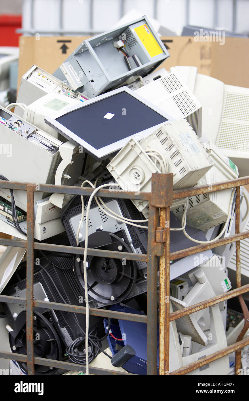 A pile of broken computer components including cases CRT and TFT