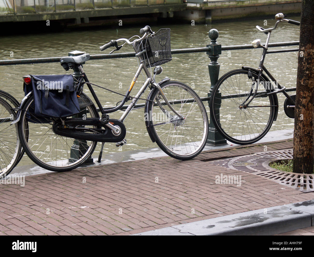 Canal side bikes in amsterdam Stock Photo