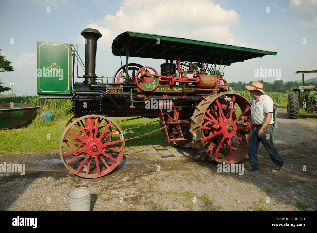 Farmer Steve Davis restores a 1914 antique steam traction engine Winfield New York Great Western Turnpike Route 20 Stock Photo