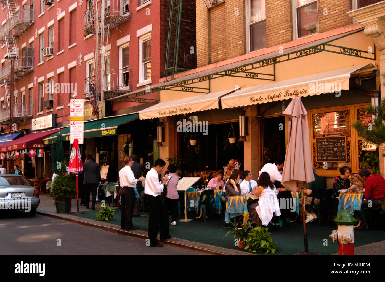 Eating at Italian restaurant in Little Italy, New York City America USA Stock Photo