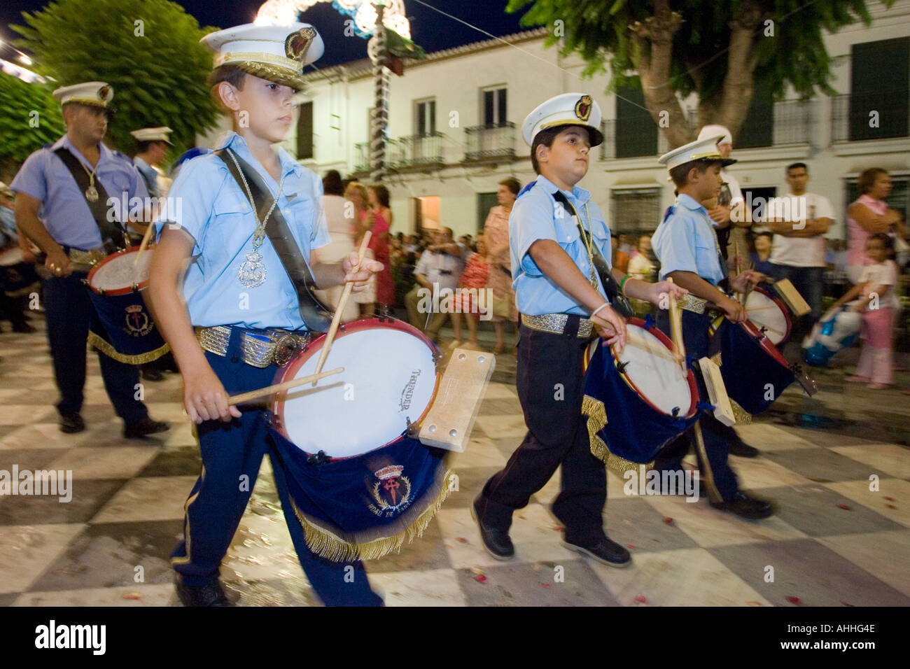Drummer kids playing in a brass band during a procession, Aznalcazar, Seville, Spain, July 2005 Stock Photo