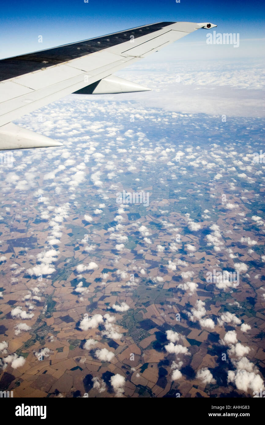 Puffy clouds from an airplane Stock Photo - Alamy