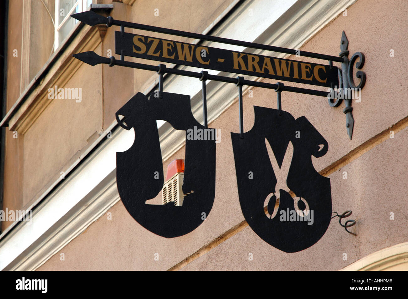 Stylish signboard of shoemaker and sewer, Old Town in Warsaw, Poland ...