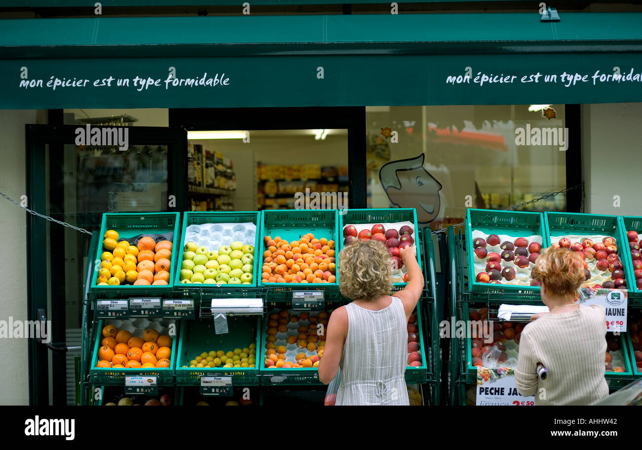 Women shopping for fruits at grocery Beaujolais wine country France Stock Photo