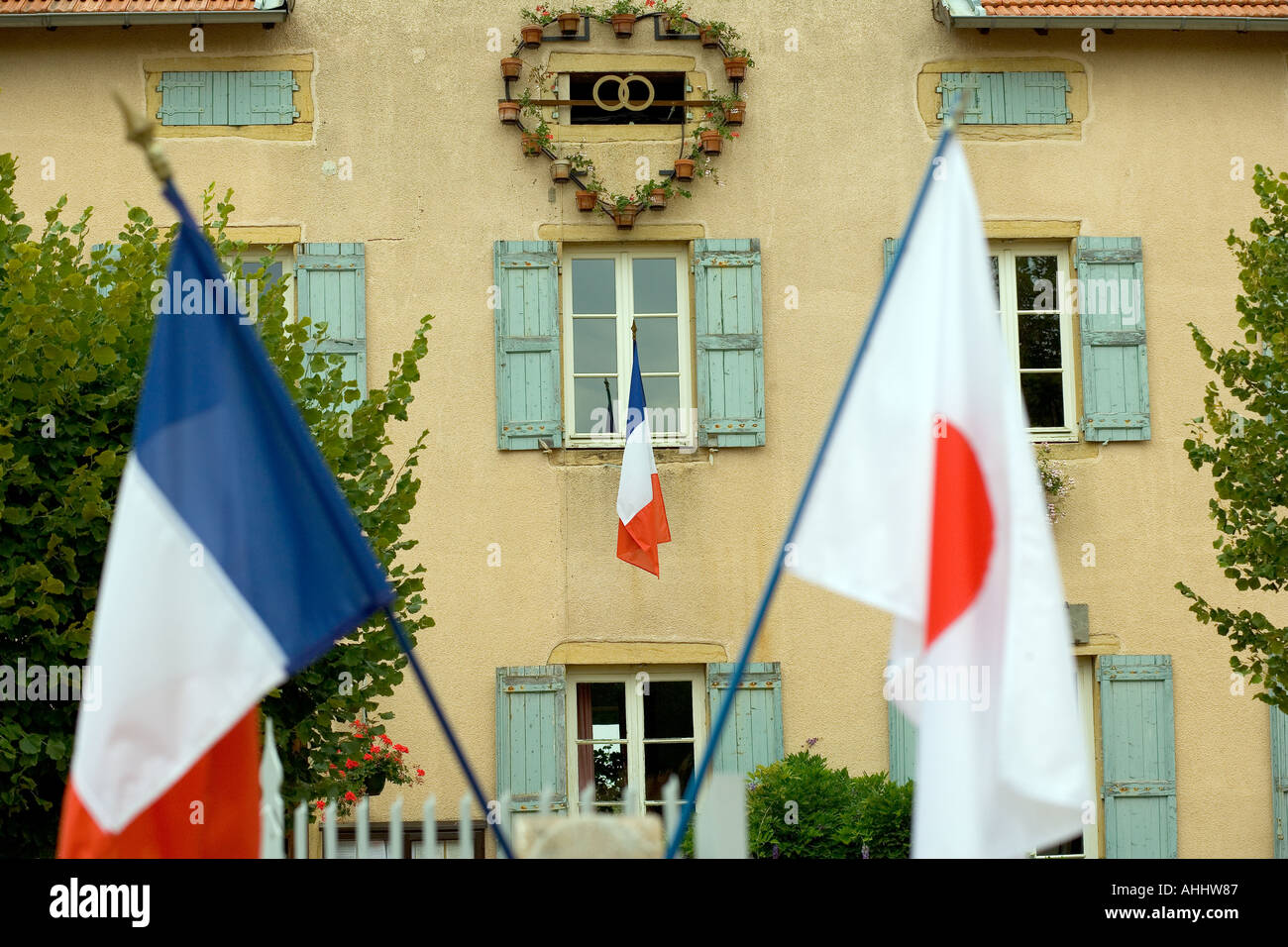 Town hall with flags "SaintAmour" Beaujolais wine country France Stock