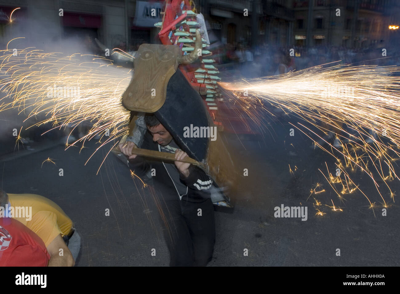 The Bull of Fire runs through crowds of children and their parents as ...