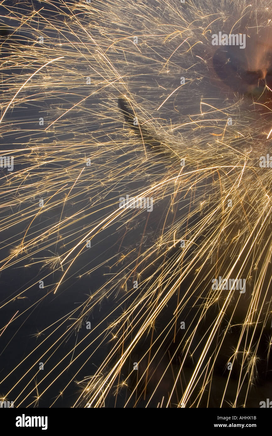 Exploding fireworks shroud the horn of the Bull of Fire in a cloak of ...