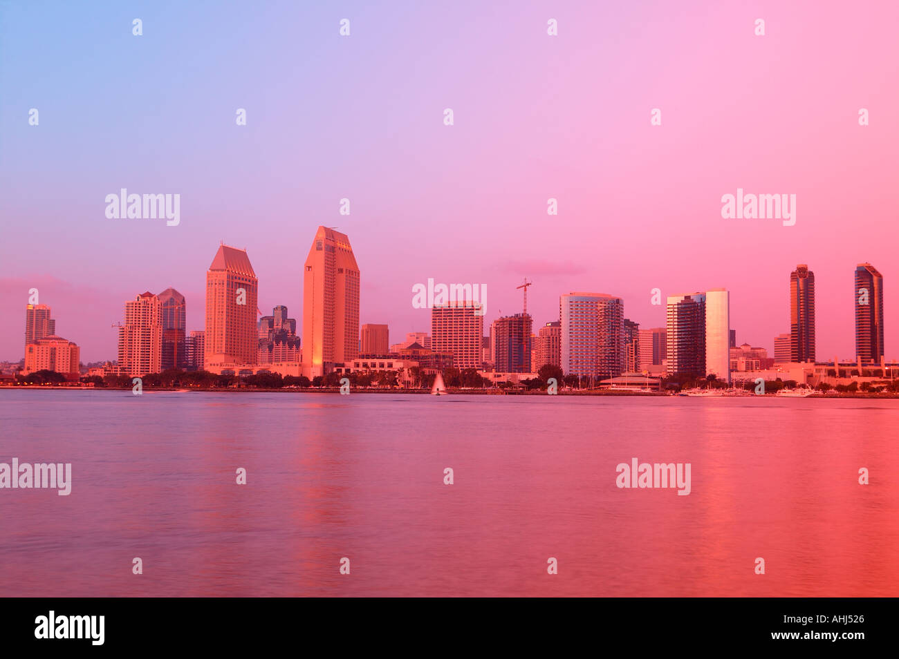 The downtown San Diego skyline as viewed from Coronado at sunset San Diego California Stock Photo