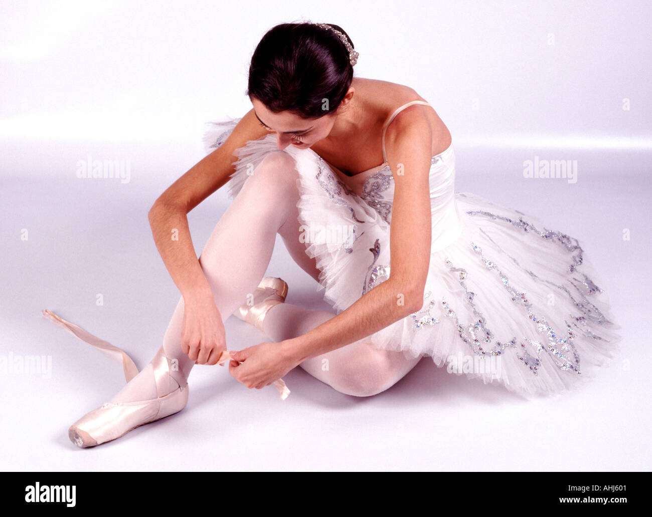 Ballerina rehearsal ballet dancer stage performance cut out cropped white background outline cutout Stock Photo