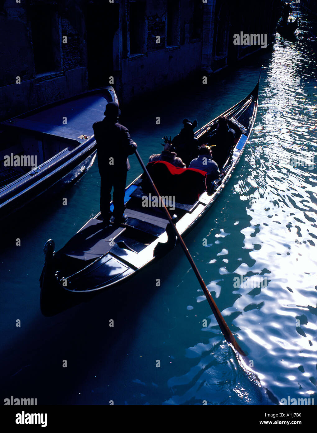 dark canal with gondola at Accademia Venice Italy Europe. Photo by Willy Matheisl Stock Photo