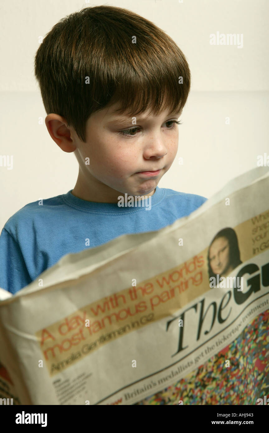 reading a broadsheet broad sheet national british Stock Photo Alamy