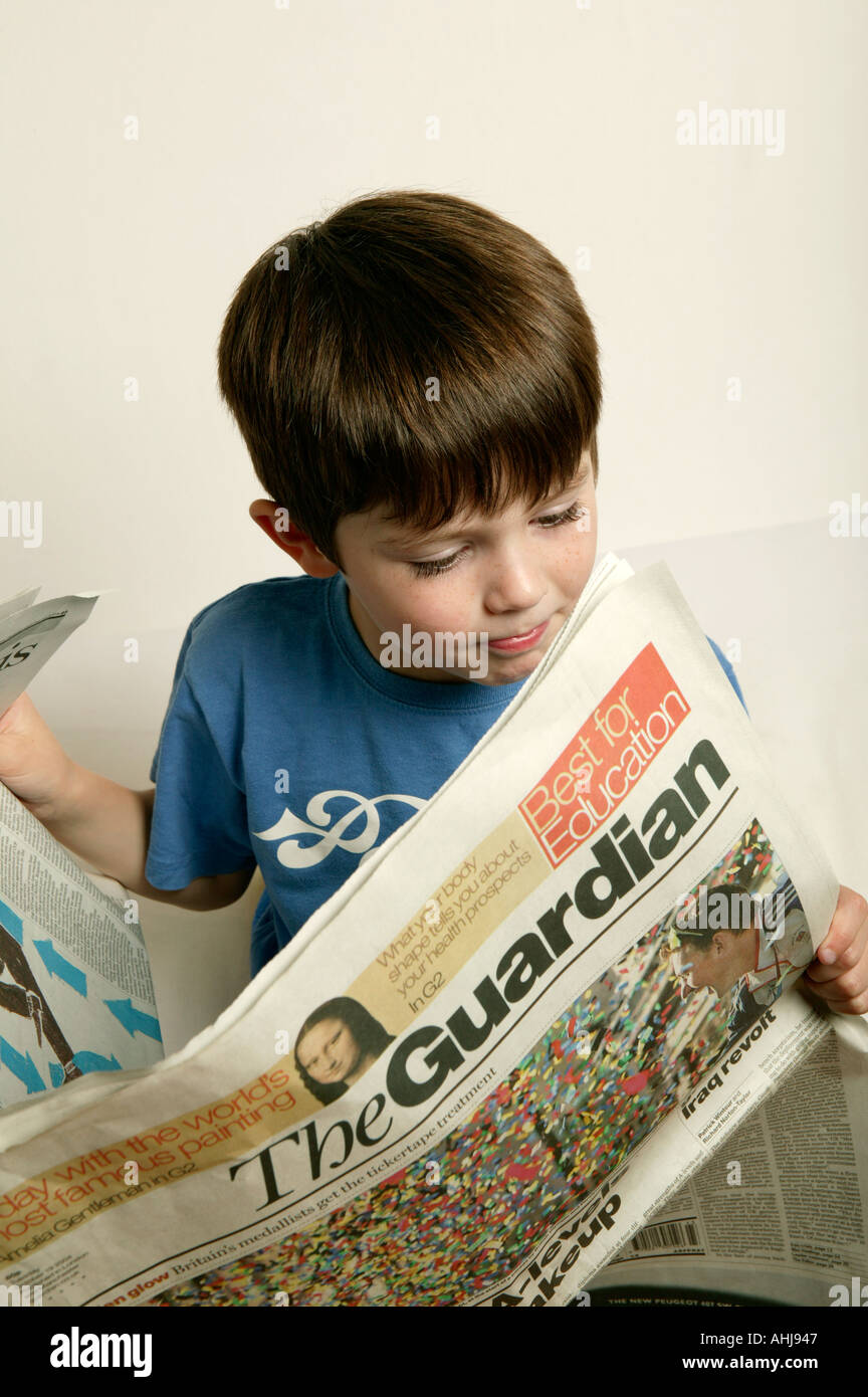 reading a broadsheet broad sheet national british Stock Photo Alamy