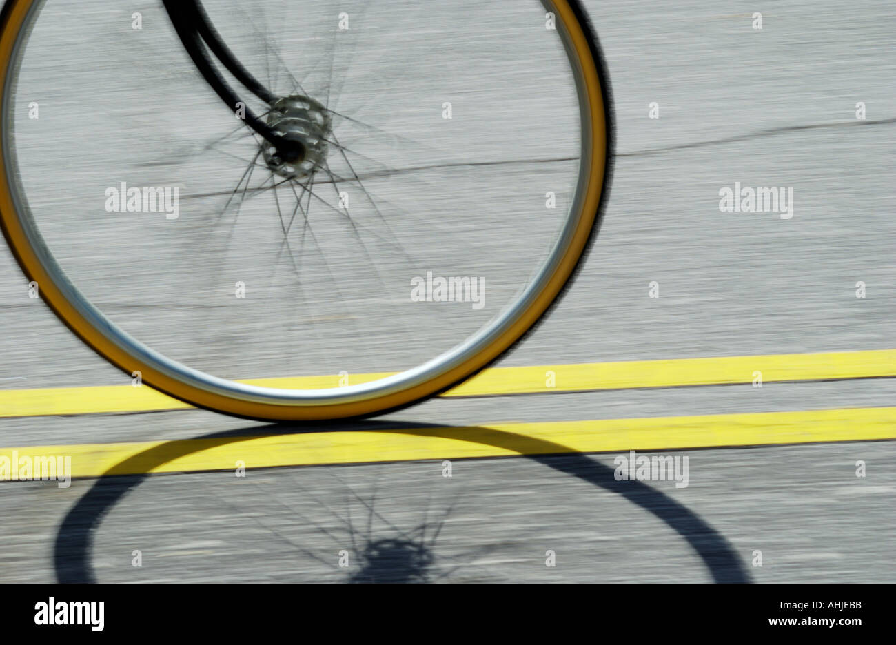 wheel of racing bicycle on track Stock Photo - Alamy