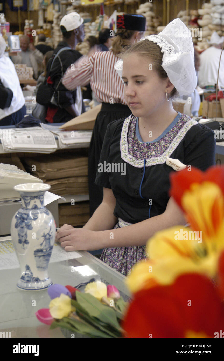 Worker wearing Traditional Dutch Garb at counter in Veldheer's gift
