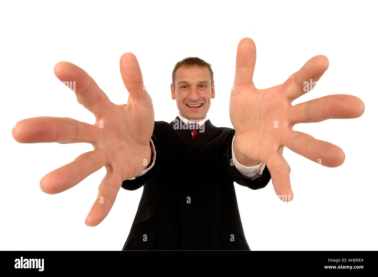 Portrait of a businessman with very large hands Stock Photo 4731363