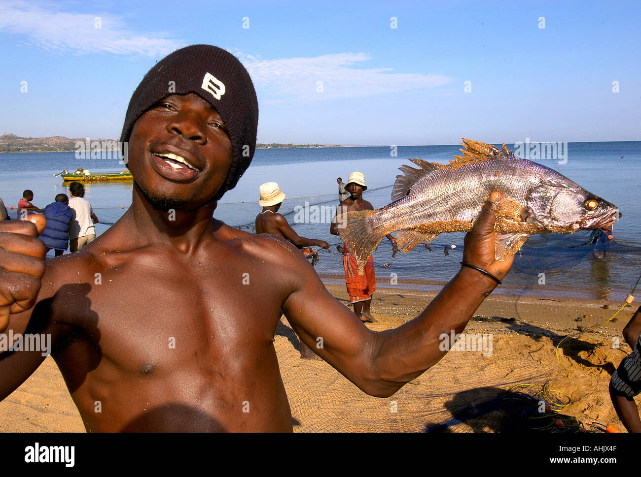 Tanzania Lake Victoria Fishing fish smile man men Stock Photo - Alamy