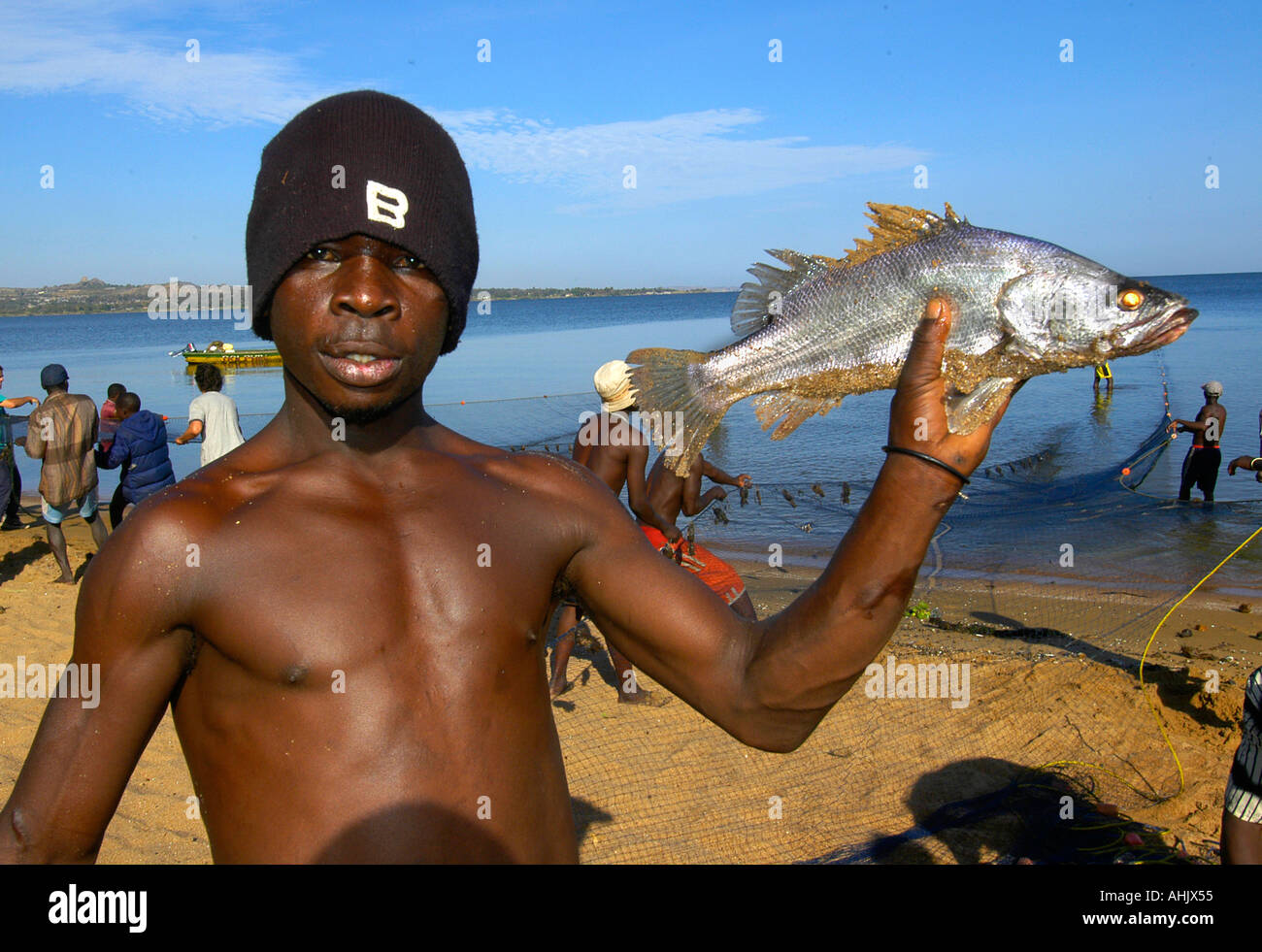 Tanzania Lake Victoria Fishing fish smile man men Stock Photo - Alamy