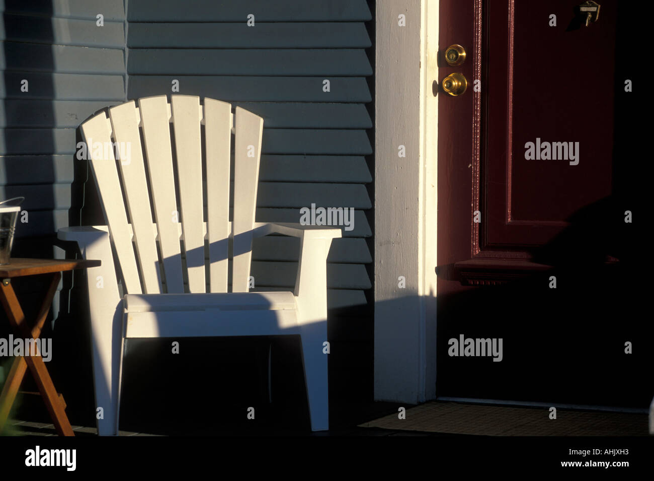 White adirondack chair on porch hires stock photography and images Alamy