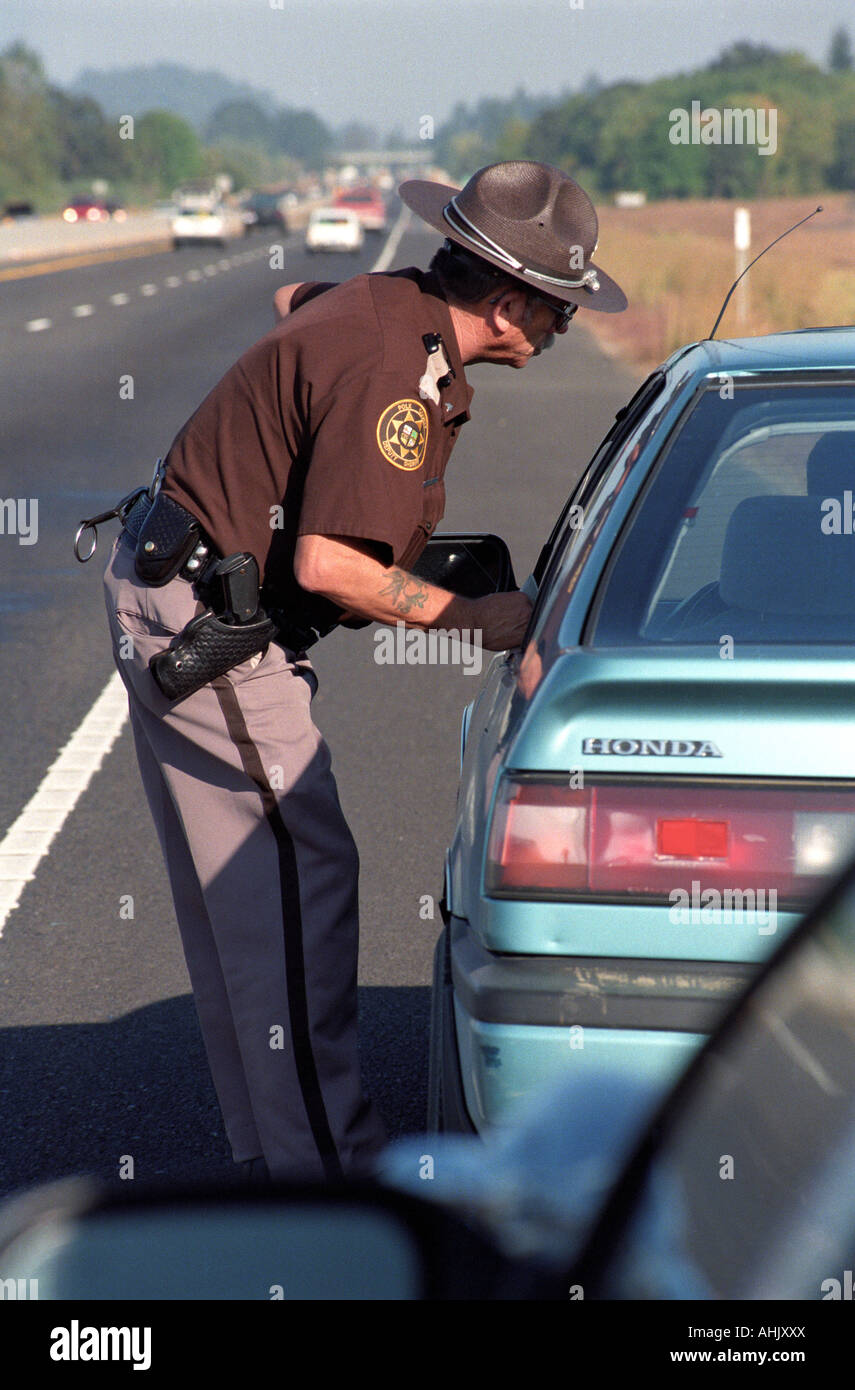 Sheriff making traffic stop for speeding Stock Photo