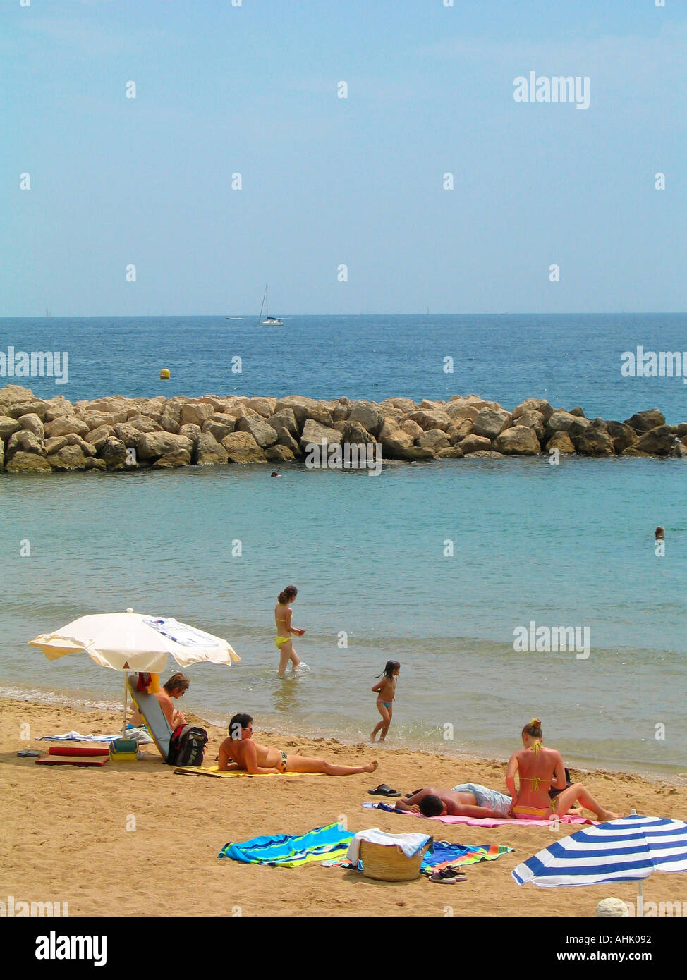 Beach life at Plage du Midi beach in Cannes on the French Riviera Stock Photo