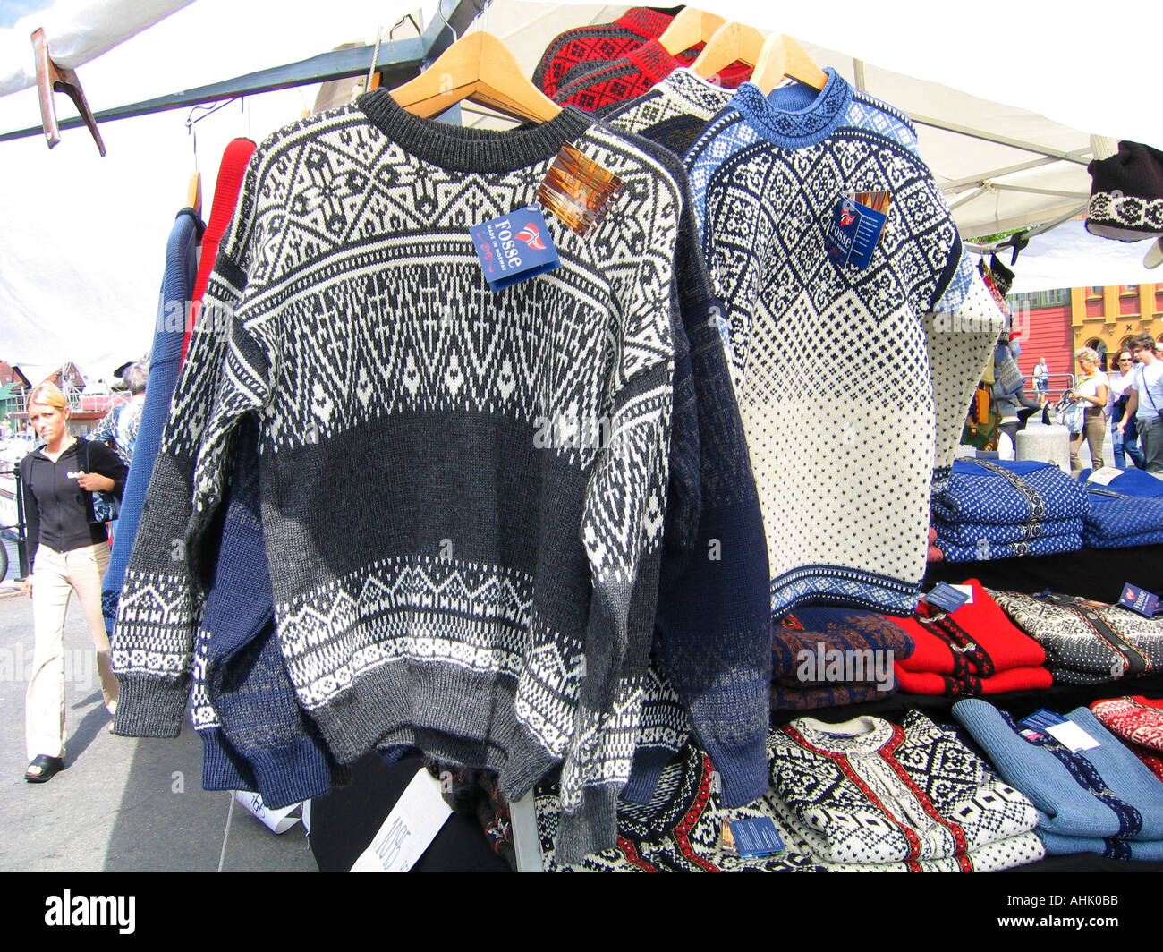 Lusekofte traditional Norwegian woolen knitted cardigan being sold at a stand at the Bergen Fish Market in Bergen Norway Stock Photo