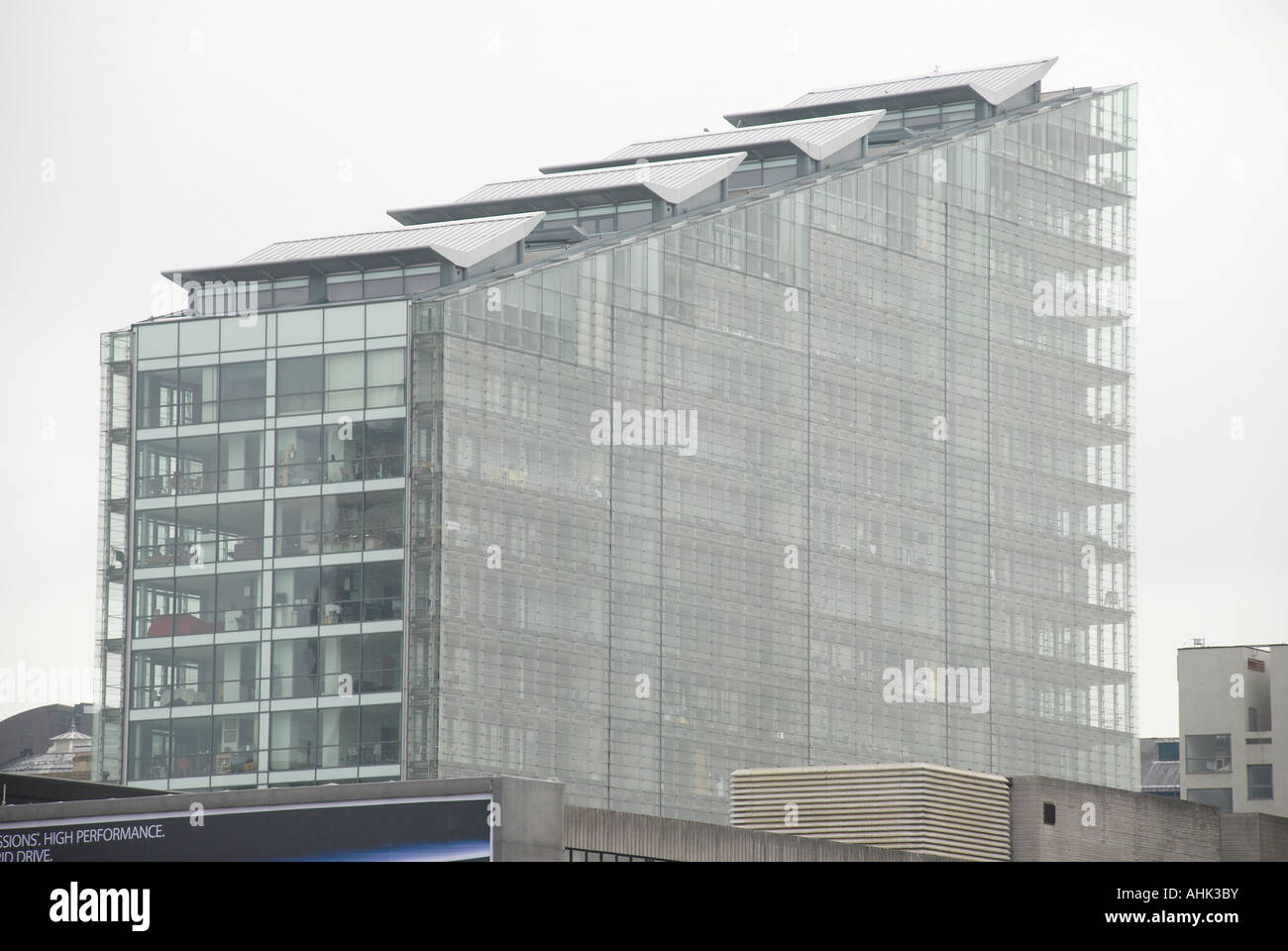 glass building with sloping roof in manchester england Stock Photo Alamy