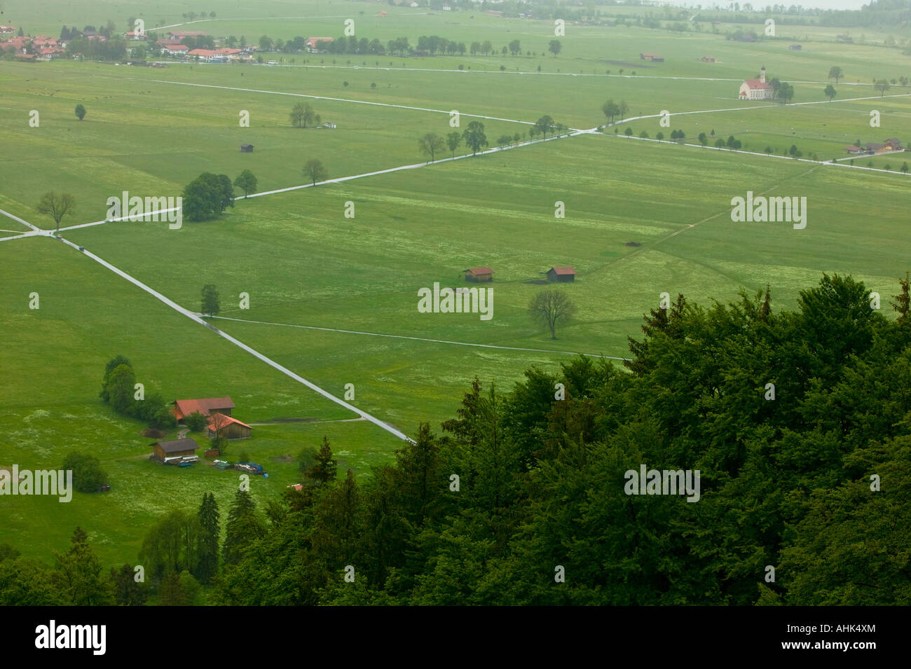 Rainy scene of countryside by Neuschwanstein castle Stock Photo - Alamy