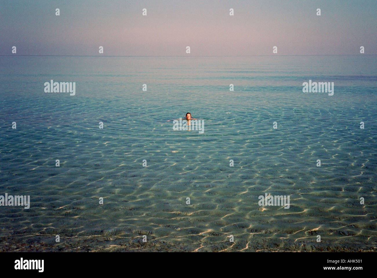 Woman swimming sea hi-res stock photography and images - Alamy
