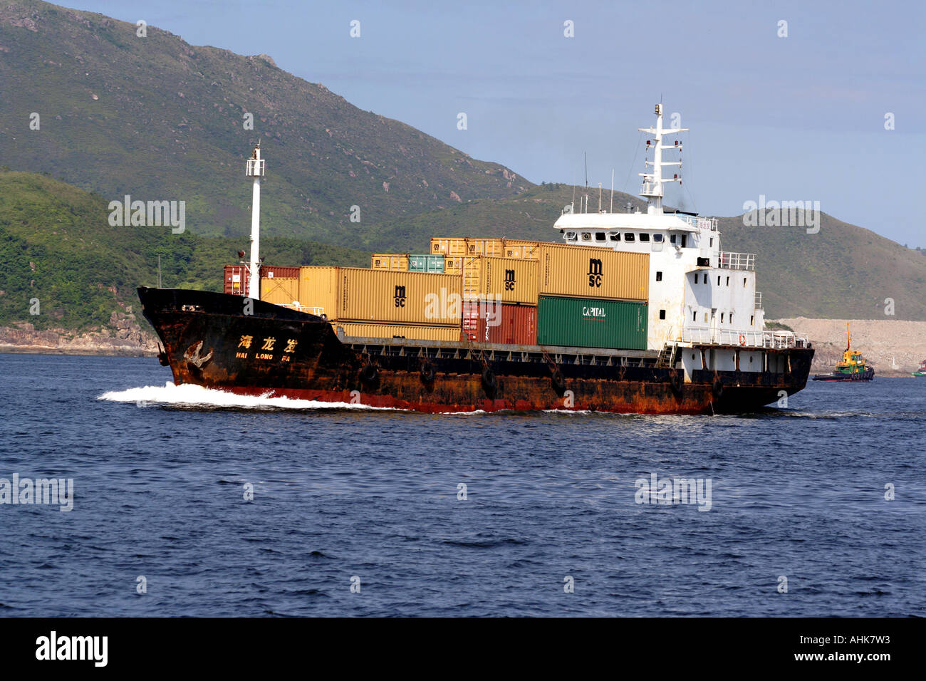 Cargo Ship Freighter Loaded With Shipping Containers, Hong Kong, China Stock Photo