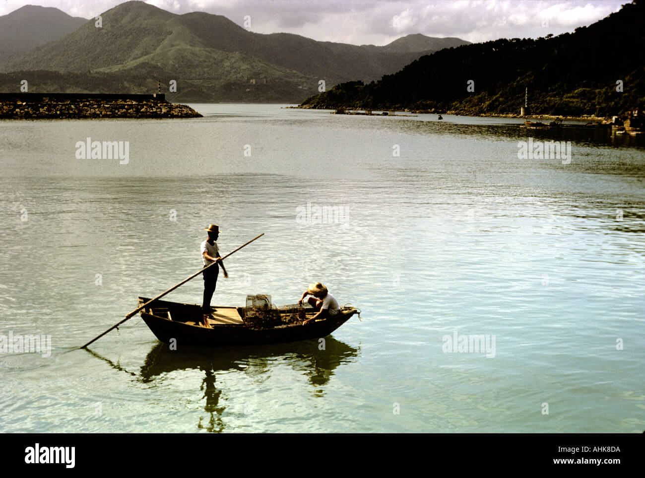 Two men in a boat hi-res stock photography and images - Alamy